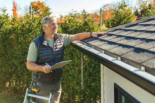 Professional Storm Damage Roof Repair technician working in Browns Summit, NC